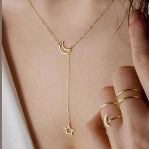 Jewelry - NWT • gold star and moon necklace Jewelry - NWT • gold star and moon necklace